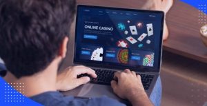 Man play online casino on laptop